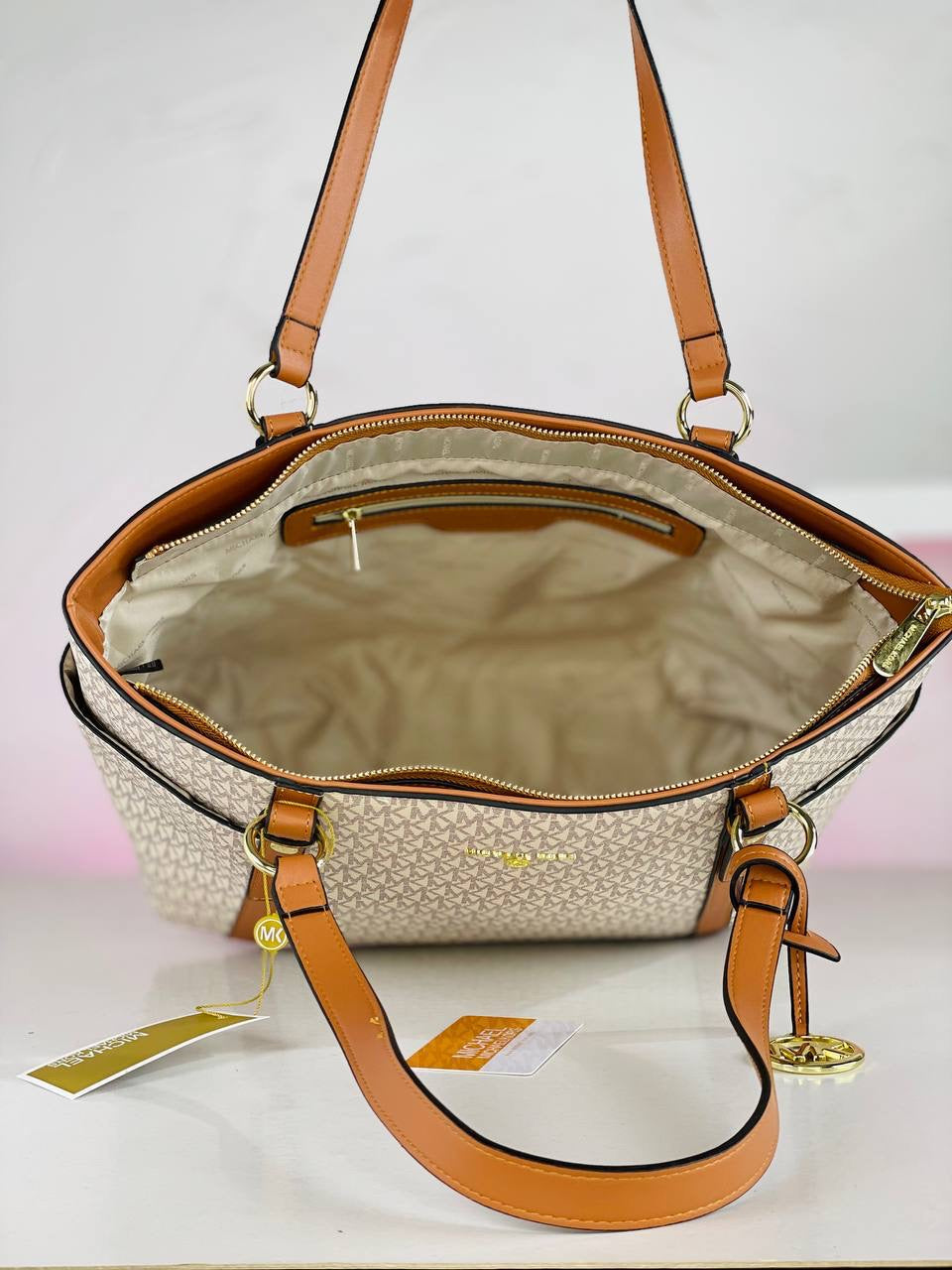 Michael Kors ( MK )