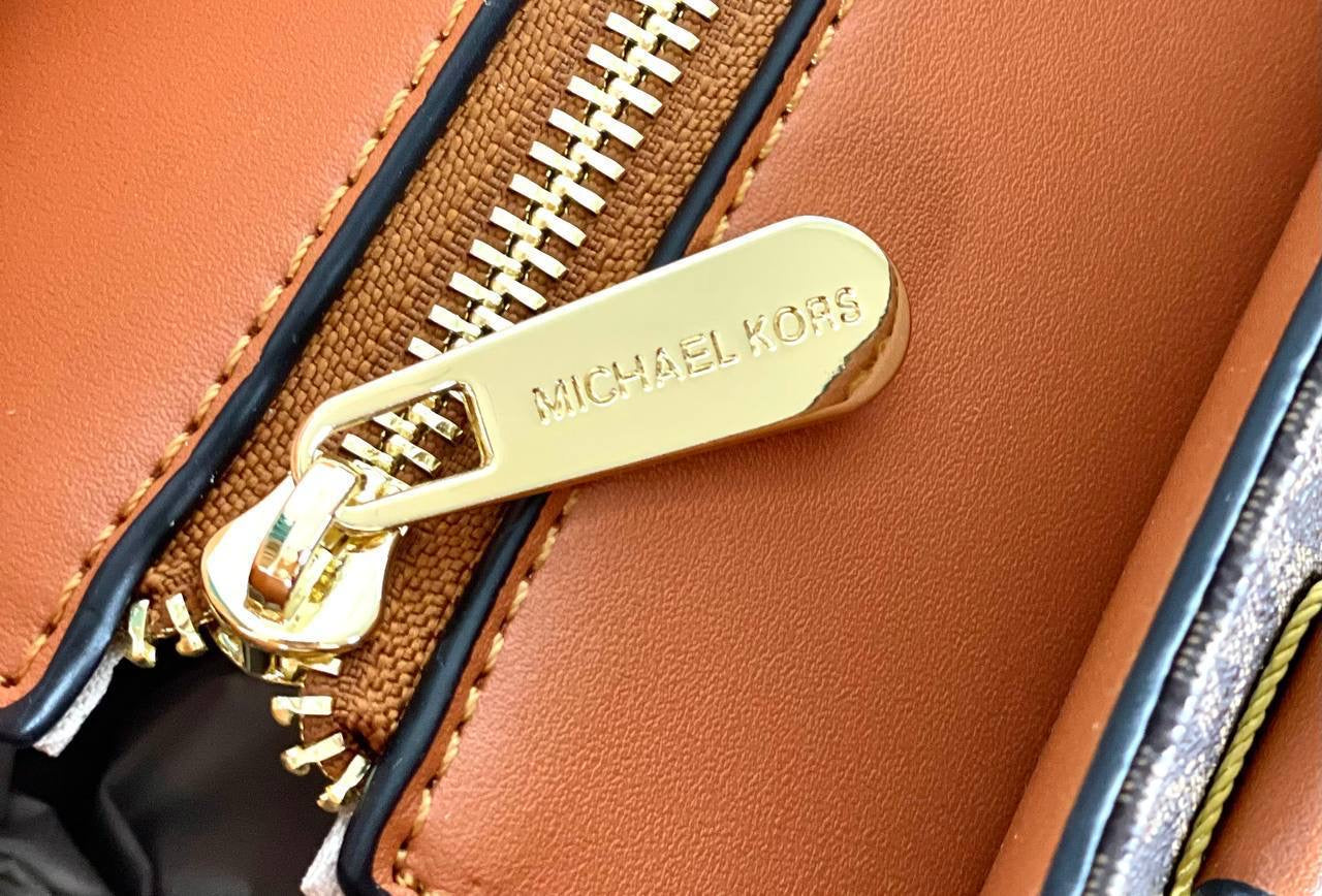 Michael Kors ( MK )